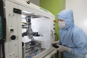 BMTF technician in a clean lab