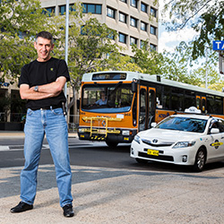 Phil Kilby with bus in background