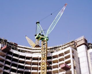 Crane being used in the construction of a high-rise building