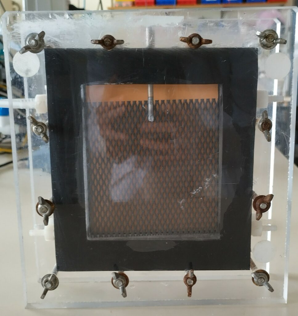 Side on view of a bioelectrochemical system (BES) similar to the one to be used in this study