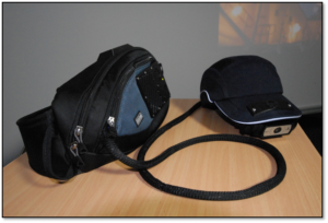 GMR show with shoulder-bag and bump-cap used in the manufacturing industry