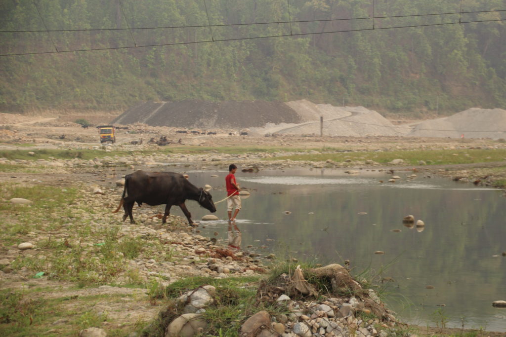 Sediment mining in a river bed, Nepal