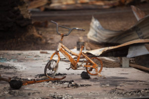 Childs bicycle destroyed by bushfire, Dunalley, Tasmania