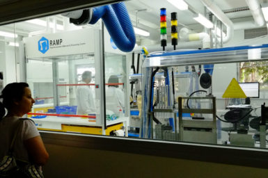 A woman looks into the RAMP lab.